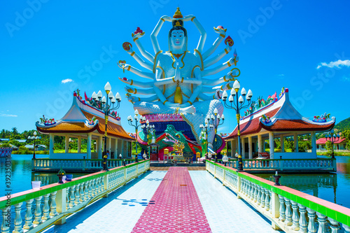 Statue of  Guanyin with eighteen arms at Wat Plai Laem photo