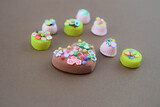  Over decorated cookies or cakes on brown background