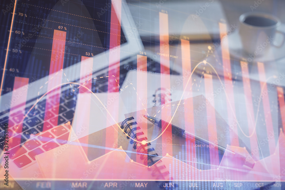 Double exposure of financial chart drawing and desktop with coffee and items on table background. Concept of forex market trading Double exposure of financial chart drawing and desktop with coffee and items on table background. Concept of forex market trading