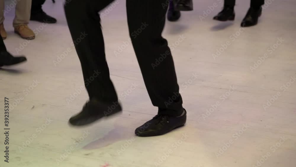People dancing at the party in night club or disco People dancing at the party in night club or disco