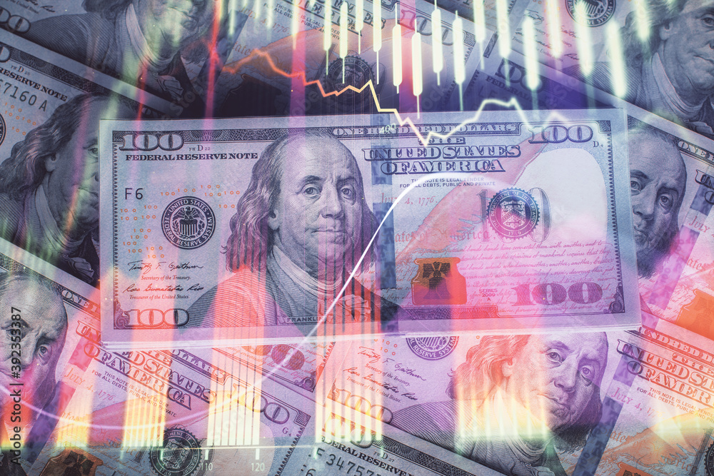 Fototapeta premium Multi exposure of forex chart drawing over us dollars bill background. Concept of financial success markets.