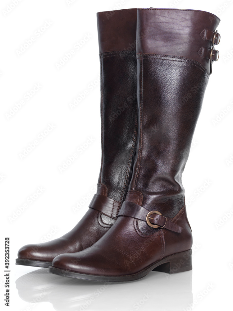 Knee-high brown leather fashion womens boots isolated on white background