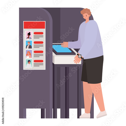 man voting with ligth brown hair and purple coat in gray voting booth