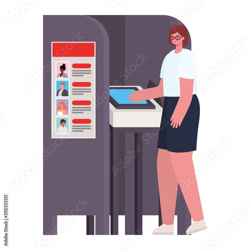 woman voting with brown hair, white shirt glasses in gray voting booth