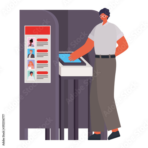 man voting with black hair and whithe shirt in gray voting booth