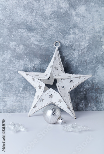 Christmas star on bright wooden background. Close up.  © Eugeniusz Dudziński