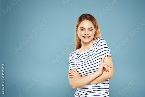 Pretty woman striped t-shirt fun emotions lifestyle blue background