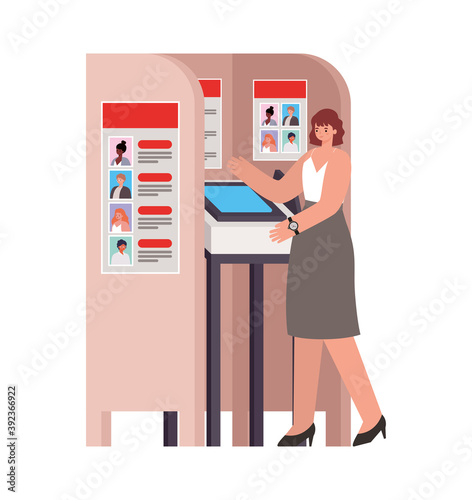 woman with reddish hair and white shirt in a voting booth
