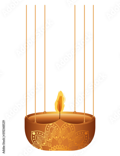 candle on a orange chandelier with flame