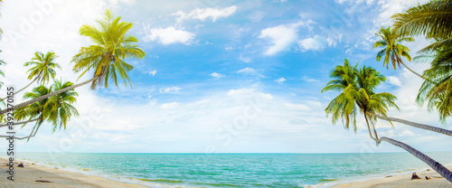Panorama summer on the beach in Thailand.blue sky and white clouds. Freshness of the new day. Bright blue background. Relaxing feeling like being in the sky.Coconut trees on the beach.sand and sea.