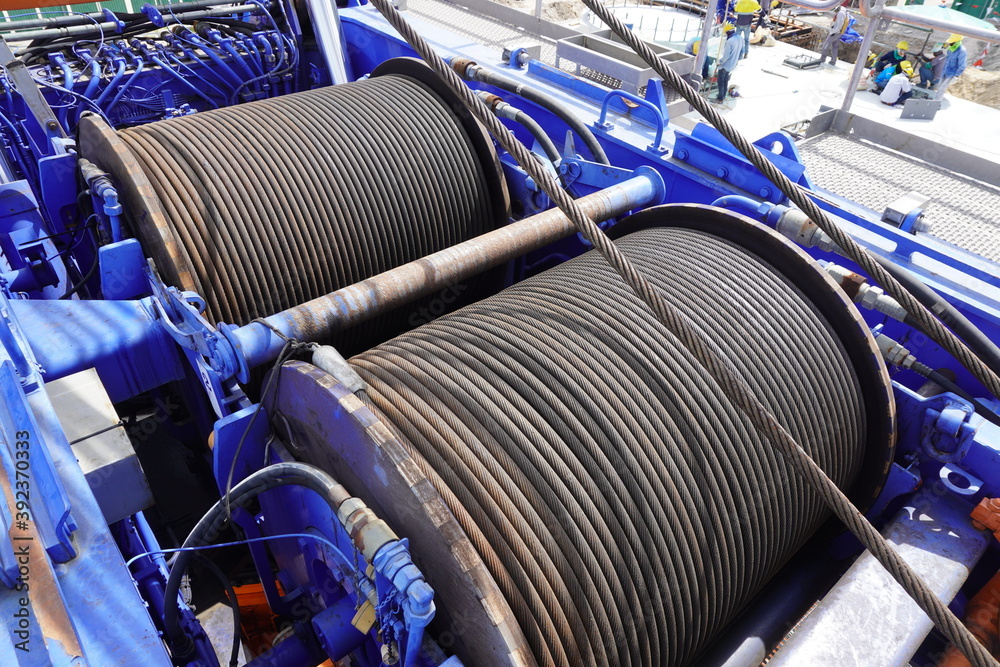 Φωτογραφία Wire rope sling or cable sling on crane reel drum or winch roll of crane the lifting machine in heavy industrial