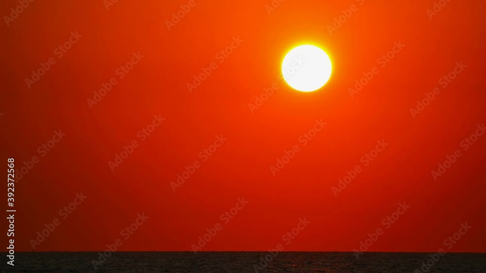 sunset red sky down back dark cloud moving over ocean time lapse sunset red sky down back dark cloud moving over ocean time lapse