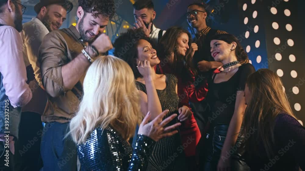 People dancing at the disco People dancing at the disco