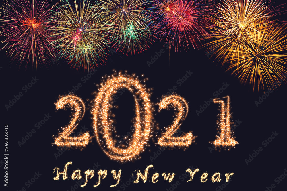 2021 and Happy New Year written with Sparkle firework on dark background, Happy new year and merry christmas celebration, banner and greeting cards concept