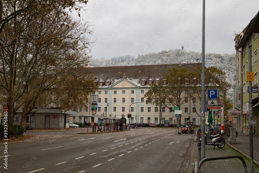Freiburg im Breisgau/Germany - 10 28 2012: Empty european street on the cloudy autumn day after first snow 