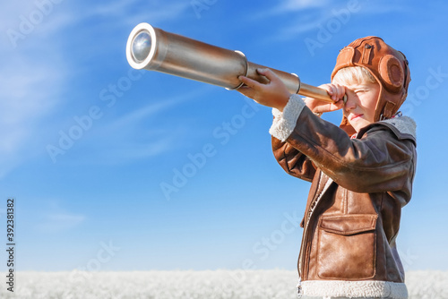 Fotobehang Young aviator with a telescope