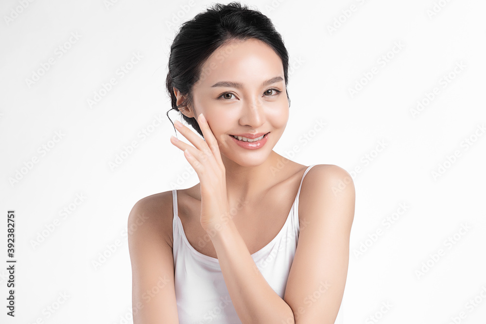 Beautiful young asian woman with clean fresh skin on white background, Face care, Facial treatment, Cosmetology, beauty and spa, Asian women portrait Beautiful young asian woman with clean fresh skin on white background, Face care, Facial treatment, Cosmetology, beauty and spa, Asian women portrait