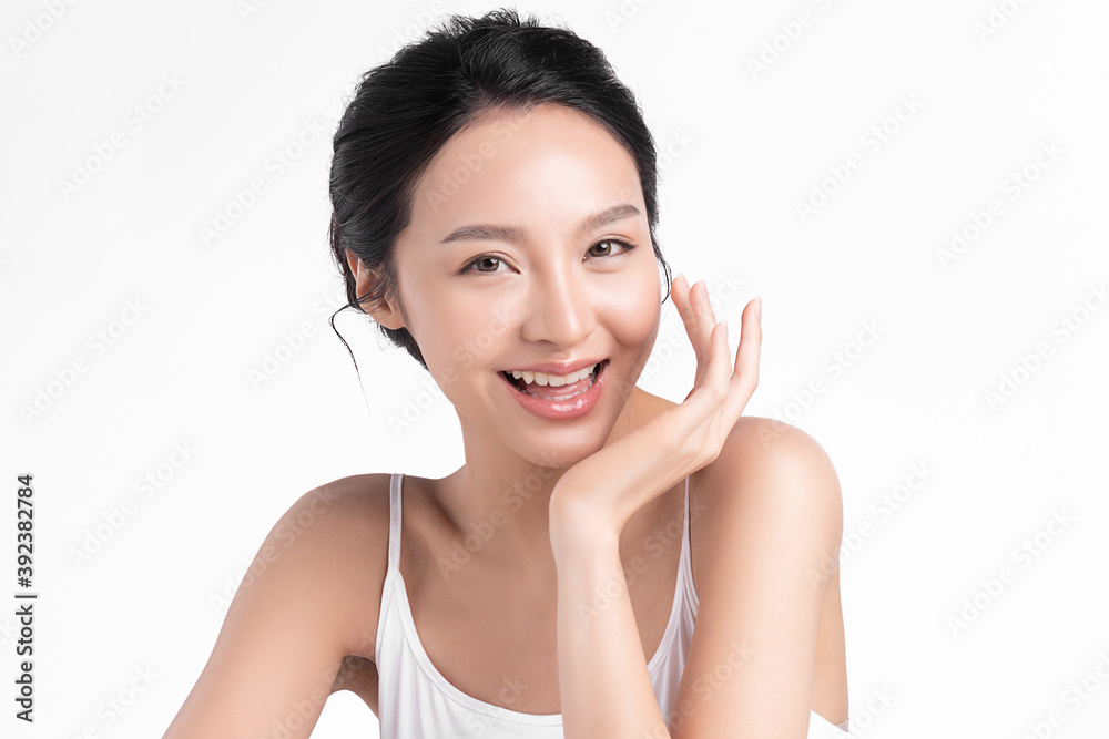 Beautiful young asian woman with clean fresh skin on white background, Face care, Facial treatment, Cosmetology, beauty and spa, Asian women portrait Beautiful young asian woman with clean fresh skin on white background, Face care, Facial treatment, Cosmetology, beauty and spa, Asian women portrait
