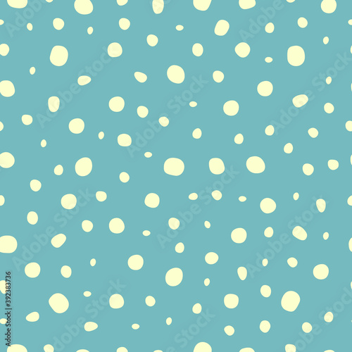 Seamless vector cute pattern with white circles on blue background for textiles, clothes and other