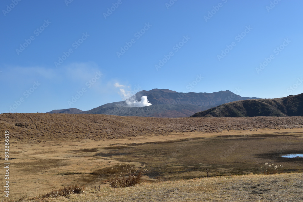 Image of Volcano and blue sky seen from the meadow