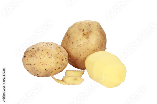 Closeup shot of freshly peeled potatoes isolated on white background photo