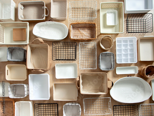 Flat lay of Marie Kondo's storage boxes, containers and baskets with different sizes and shapes