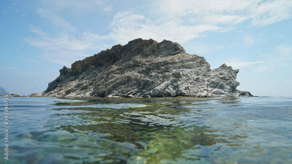 Strange rocky island shaped in a form of an animal, natural scene, Mediterranean sea, Spain, Costa Brava, Colera, Catalonia