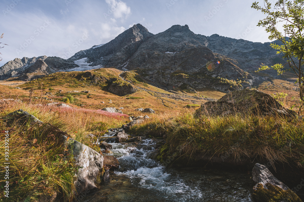 Canyon of mountain river with blue water. Autumn in Caucasus mountain. Hiking and eco tourism in mountain. Canyon of mountain river with blue water. Autumn in Caucasus mountain. Hiking and eco tourism in mountain.