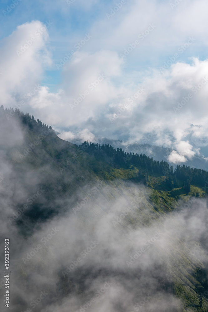 Spectacular Mountains With Fog And Clouds