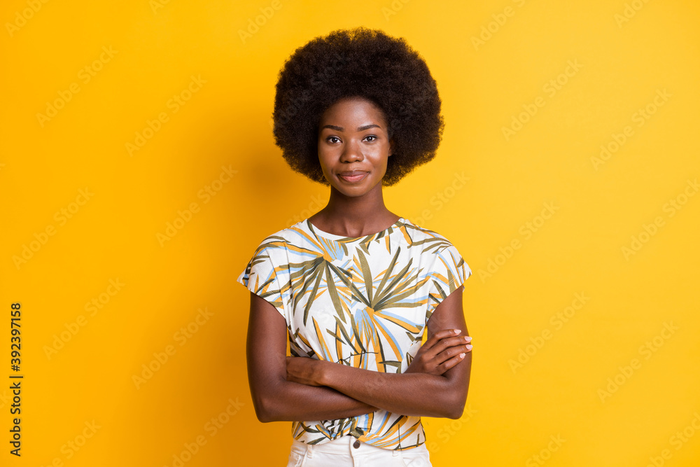 Portrait of cool optimistic short hair lady stand crossed arms dress bright t-shirt isolated on bright yellow color background Portrait of cool optimistic short hair lady stand crossed arms dress bright t-shirt isolated on bright yellow color background