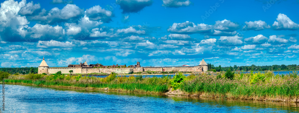 Obraz premium Old Russian fortress Oreshek, founded in 1323. The fortress is located on the Walnut island at the source of the Neva river from lake Ladoga. Shlisselburg, Leningrad region, Russia