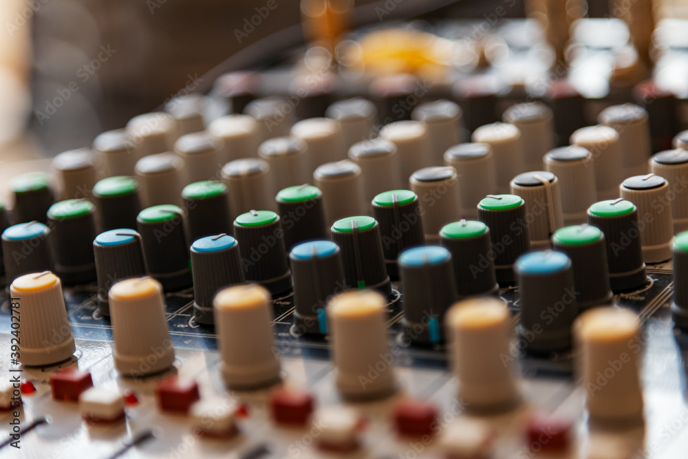 Obraz premium Mixing console for the sound engineer. Music. Sound. Sound controller. The Director's console.