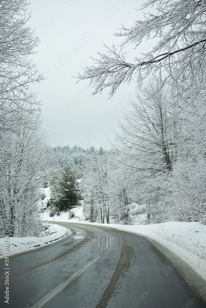 Winter road through the mountains