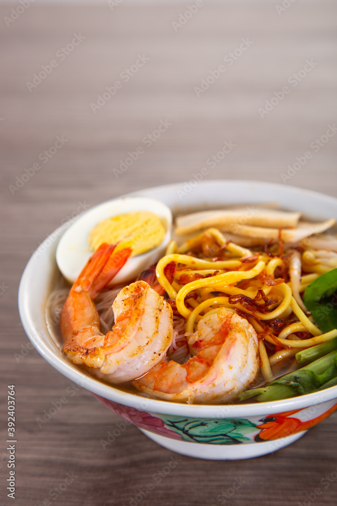 Spicy Prawn Noodle. A delicacy made popular by the Chinese in Malaysia and Singapore Spicy Prawn Noodle. A delicacy made popular by the Chinese in Malaysia and Singapore