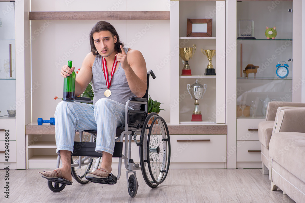 Man ex-champion in wheel-chair suffering from alcoholism Man ex-champion in wheel-chair suffering from alcoholism