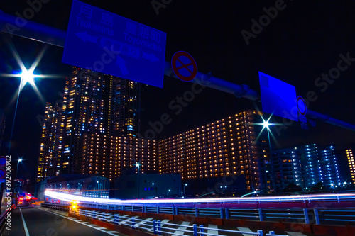 Photography A night city street in Tokyo wide shot