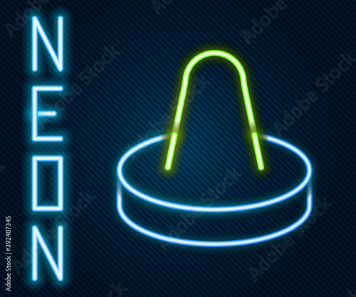 Glowing neon line Mallet and puck for playing air hockey game icon isolated on black background. Colorful outline concept. Vector Illustration.