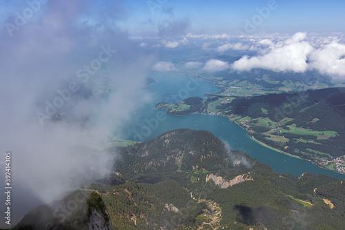 Looking through the clouds at the Mondsee, seen from the Schafberg