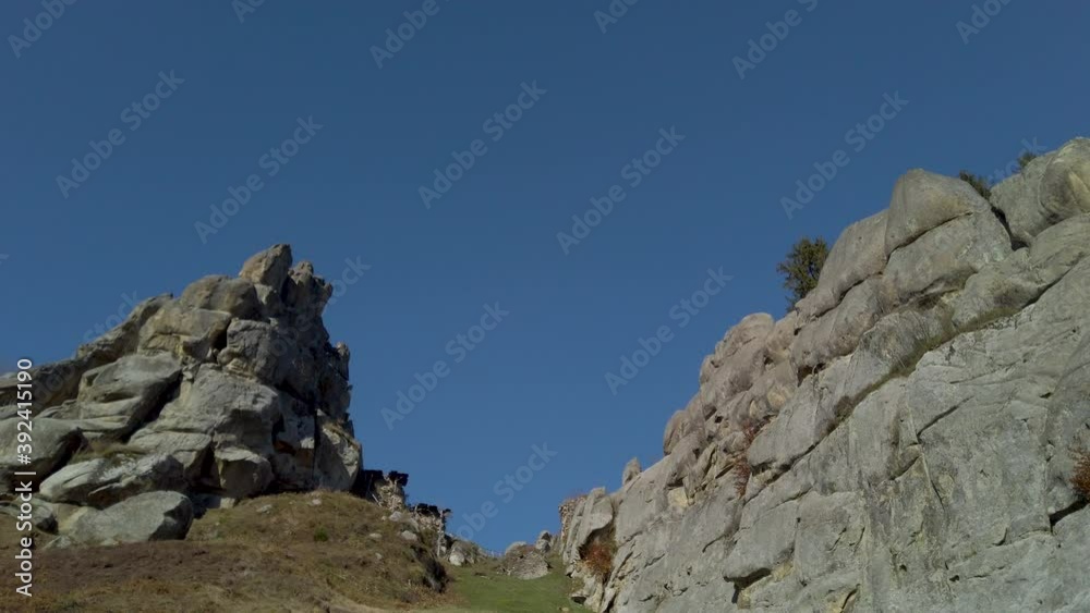 Beautiful natural landscape, panoramic view on a high rocks, clear blue sky on background Beautiful natural landscape, panoramic view on a high rocks, clear blue sky on background