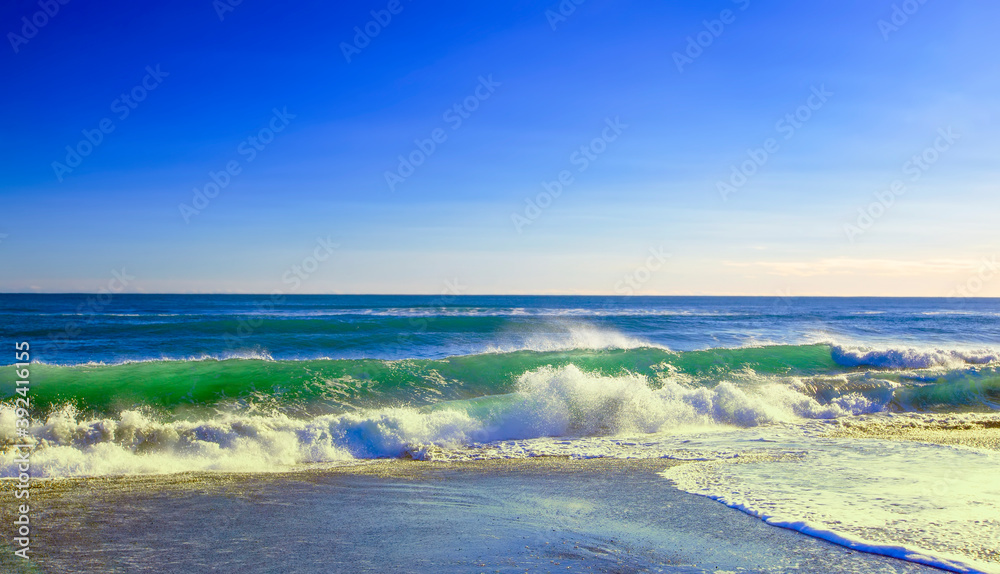 Landscape summer beach background, with sunny sky at the sea