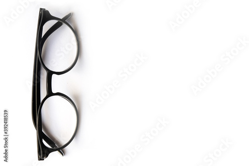 clasic and modern black glasses isolated  black square eyeglasses frameon white background, Glasses isolated on white with clipping path. background with black researcher glasses for academic writing photo