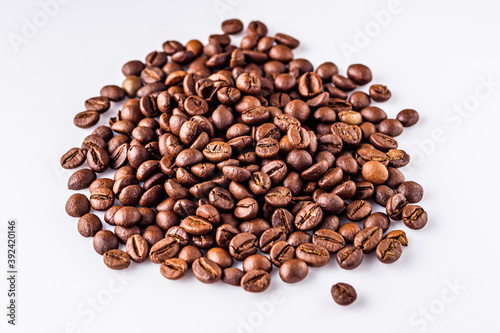 aromatic fresh coffee beans on a white acrylic background