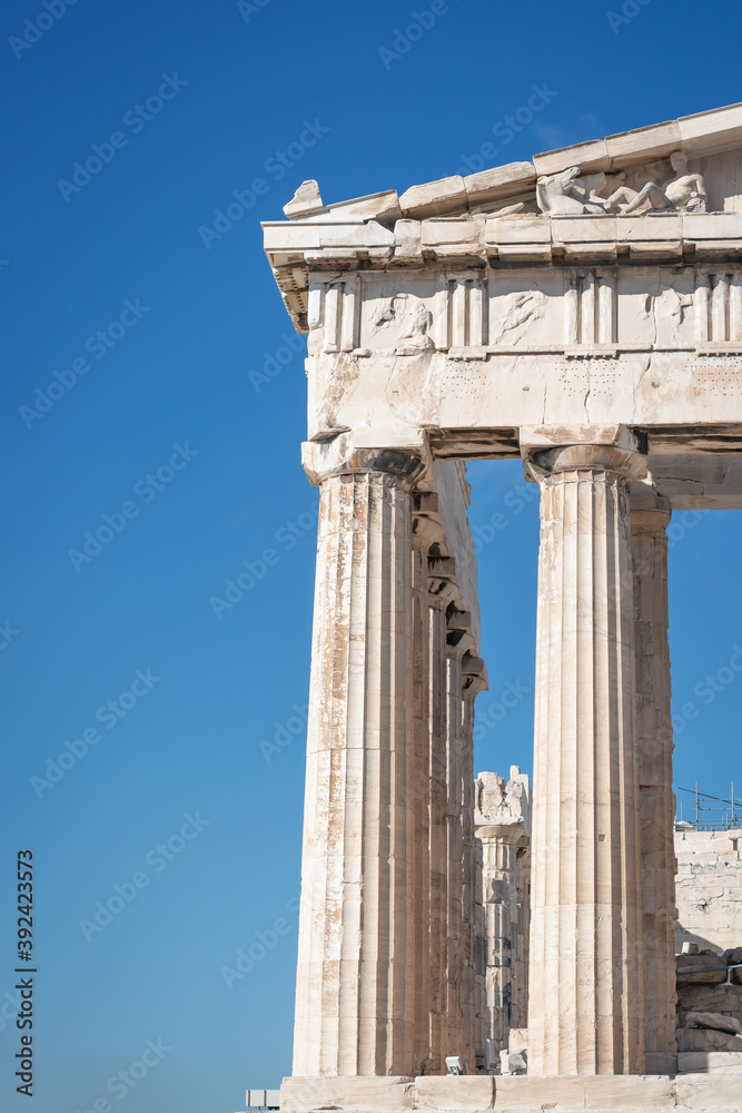 Part of the Parthenon colonnade against the blue sky