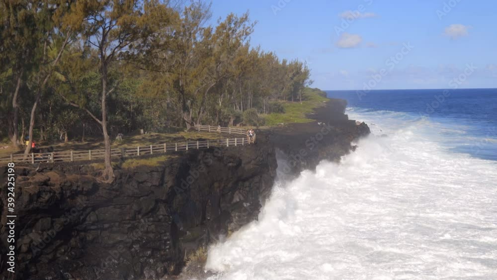 Waves breaking on the rocky coast of Cap Mechant on Reunion Island Waves breaking on the rocky coast of Cap Mechant on Reunion Island