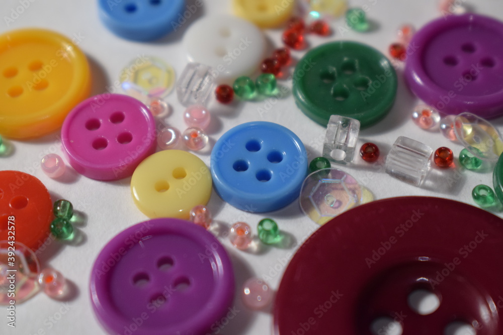 Buttons and beads on a white background Buttons and beads on a white background