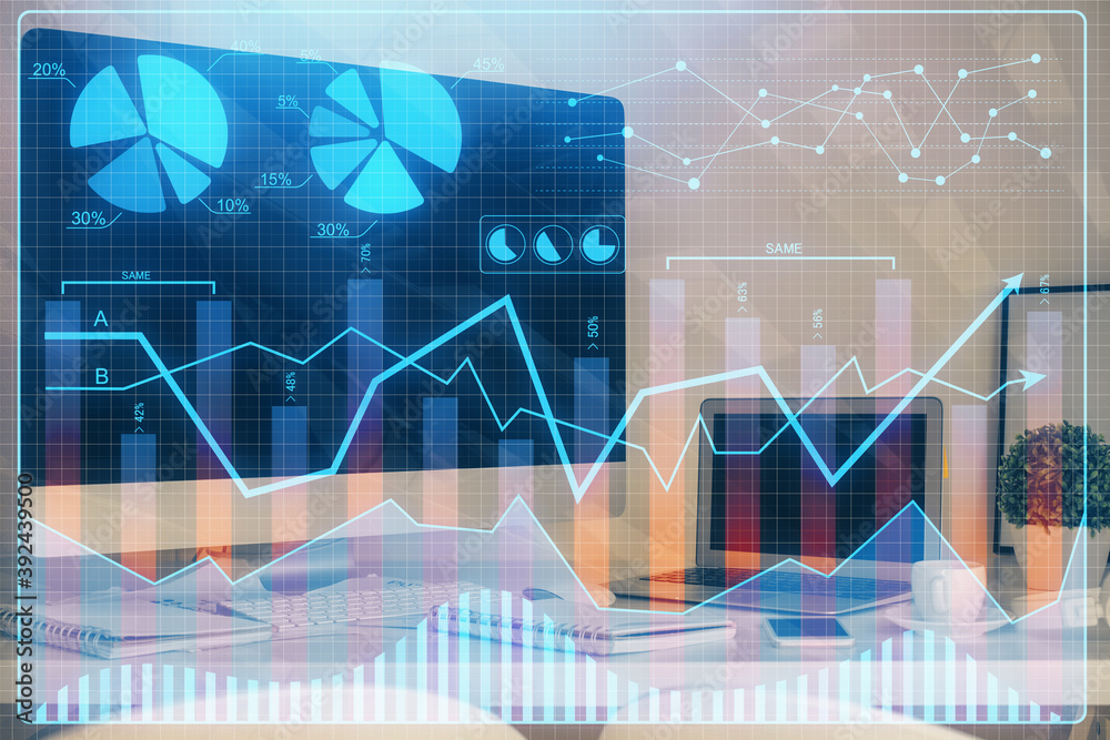 Financial chart drawing and table with computer on background. Multi exposure. Concept of international markets. Financial chart drawing and table with computer on background. Multi exposure. Concept of international markets.