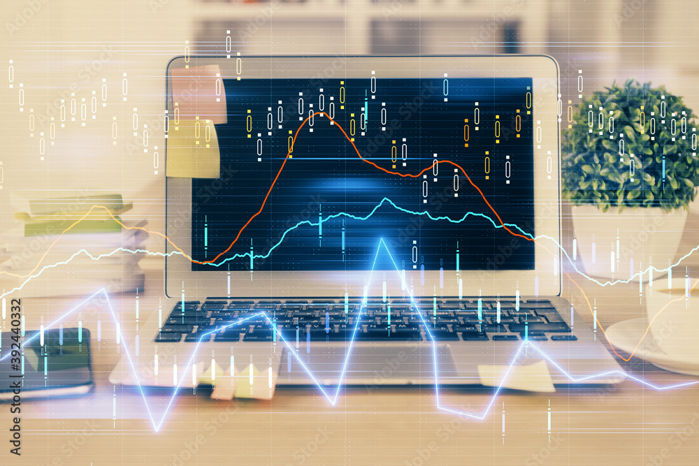 Double exposure of chart and financial info and work space with computer background. Concept of international online trading. Double exposure of chart and financial info and work space with computer background. Concept of international online trading.