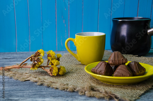 Still life with coffee beans on the wooden background