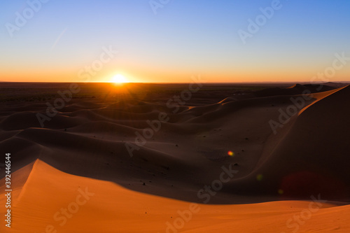 Huge desert dunes of Erg Chigaga  at the gates of the Sahara  al amanecer. Morocco. Concept of travel and adventure.