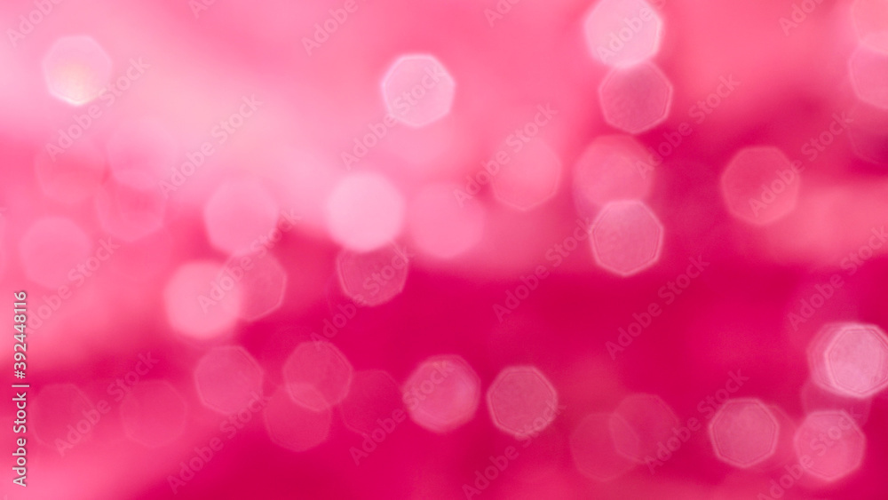 abstract bokeh blur background  the bright white color of water drop reflection on pink background for celebration and festival